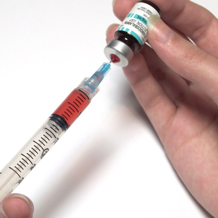 syringe filled with vitamin shot injection